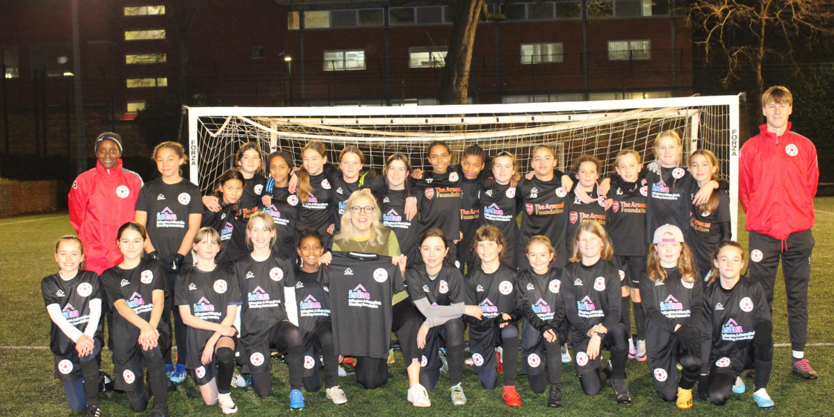 ISHA CEO Ruth Davison with Islington District Girls players and coaches