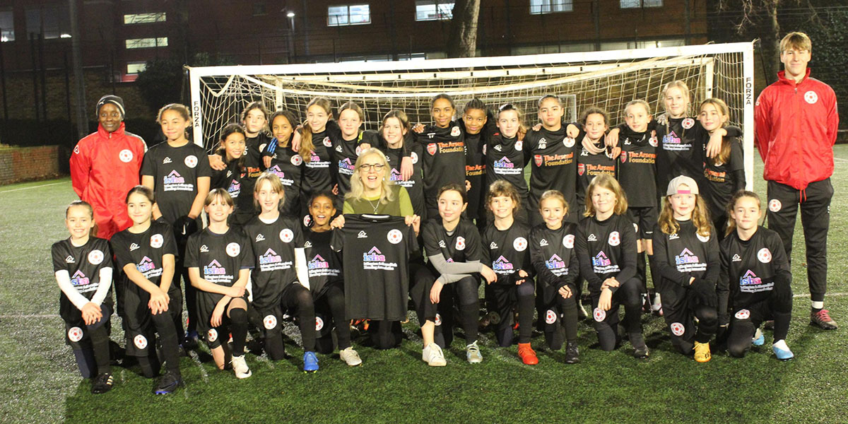 Girls football team in their ISHA sponsored kits