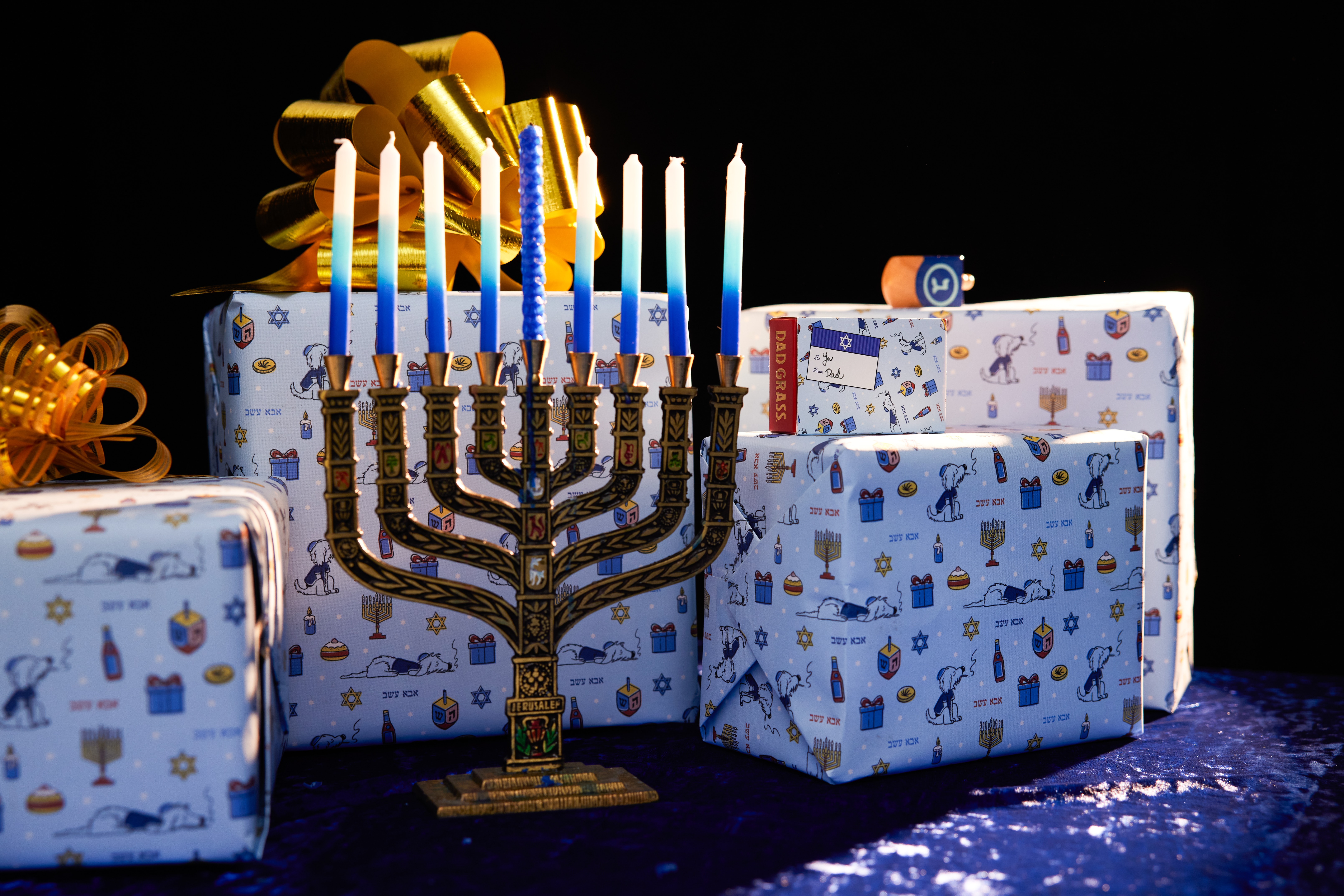 A Hanukkah menorah and wrapped presents
