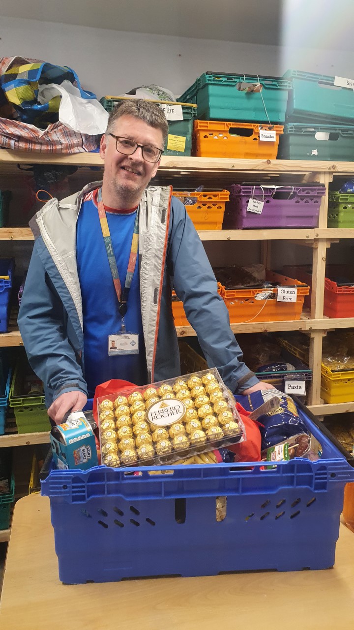 Alasdair delivering donations to the Elizabeth House Community Centre