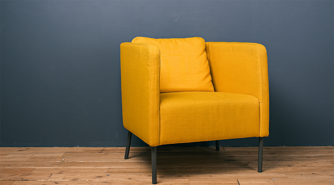 A yellow arm chair