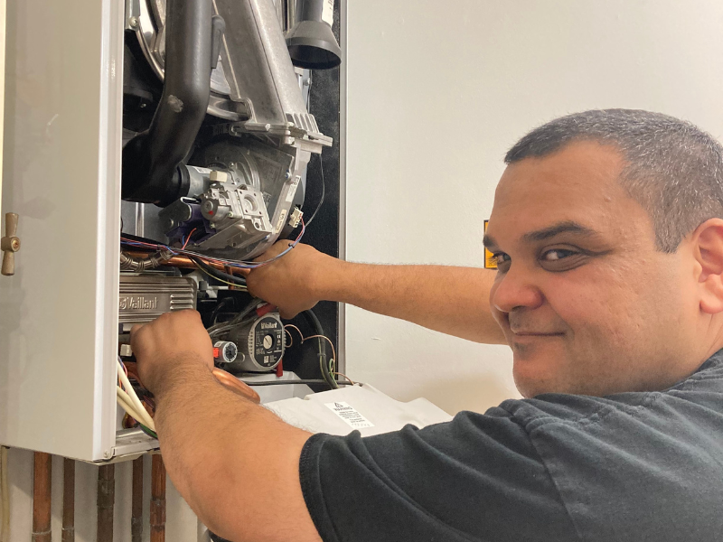 Contractor carries out repairs to a boiler. 